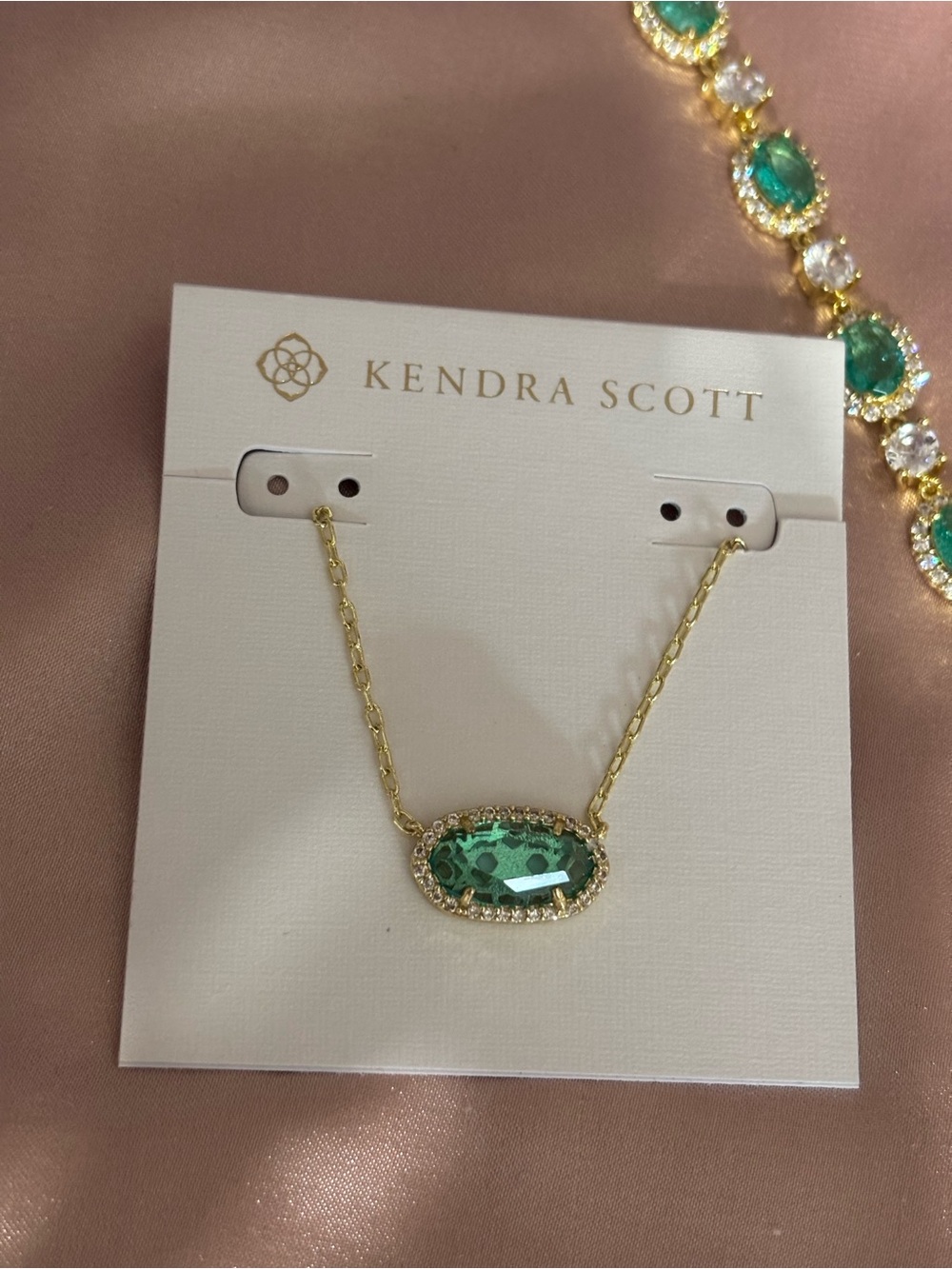 Kendra Scott Gold Necklace with Emerald Green Stone and Halo